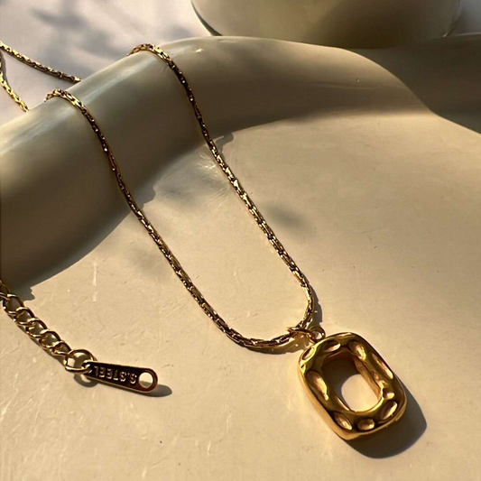 Hammered pendant