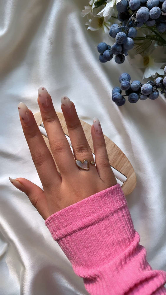Twisted heart ring