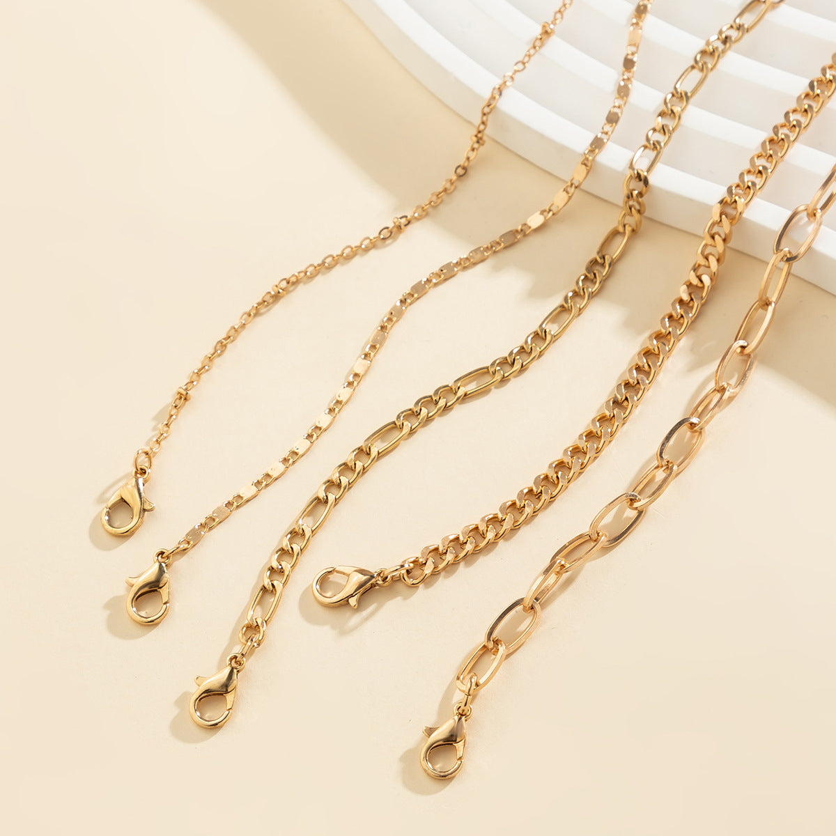 Elevate Your Edge: The Twin Cross Chain Bracelet